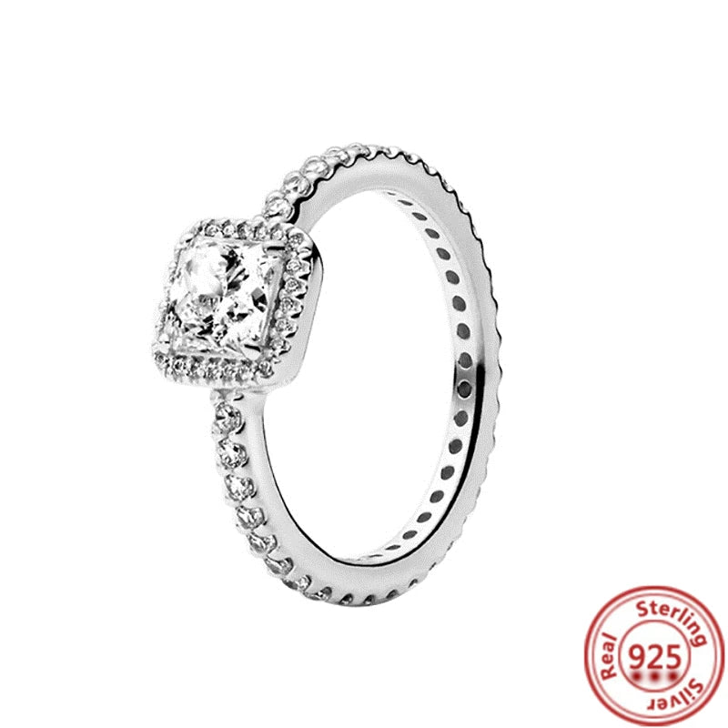 Sparkling Zircon Wings & Floral Detail – 925 Sterling Silver