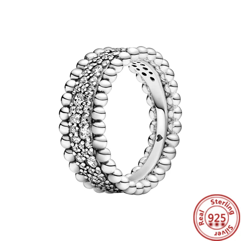 Sparkling Zircon Wings & Floral Detail – 925 Sterling Silver